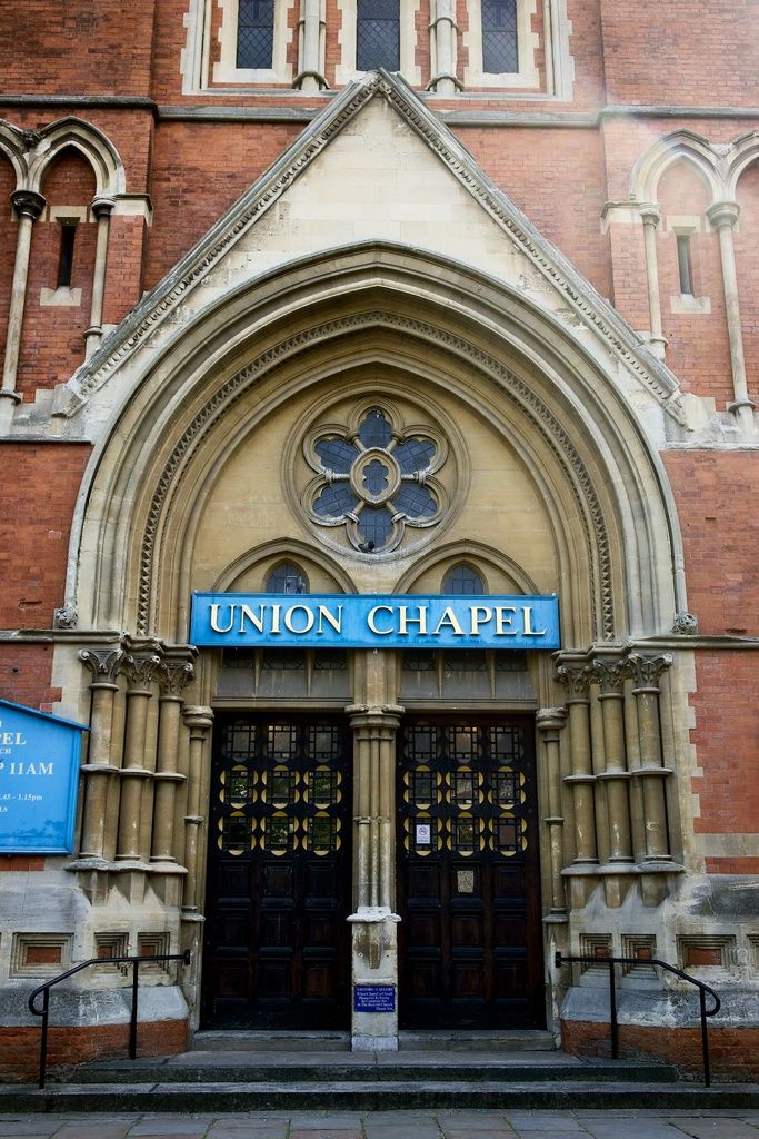 It is a famous church in London and there are many windows to the wall and in the entrance there...