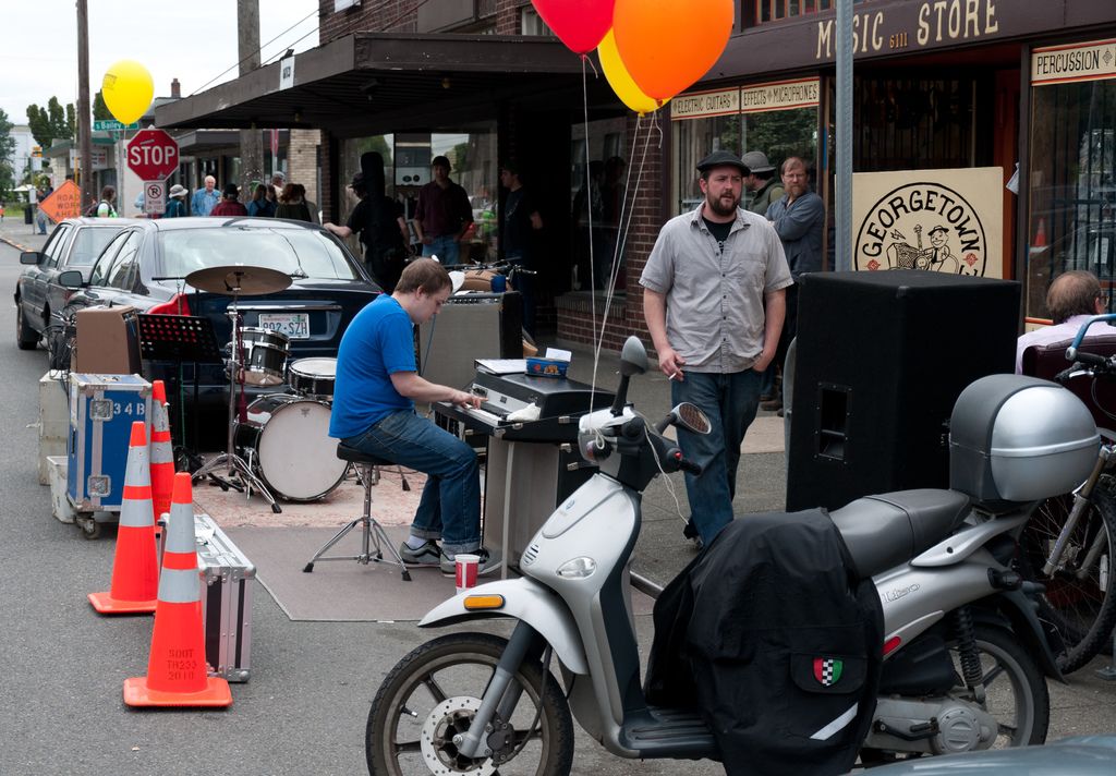 This is the picture of a place where we have a person playing some musical instruments and around...