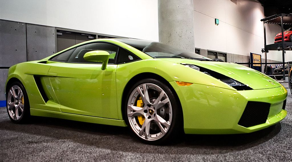 this picture shows a lamborghini sports car and a pillar