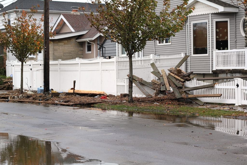 These are the houses with the windows and glass doors. I can see the wooden boards. This looks like...