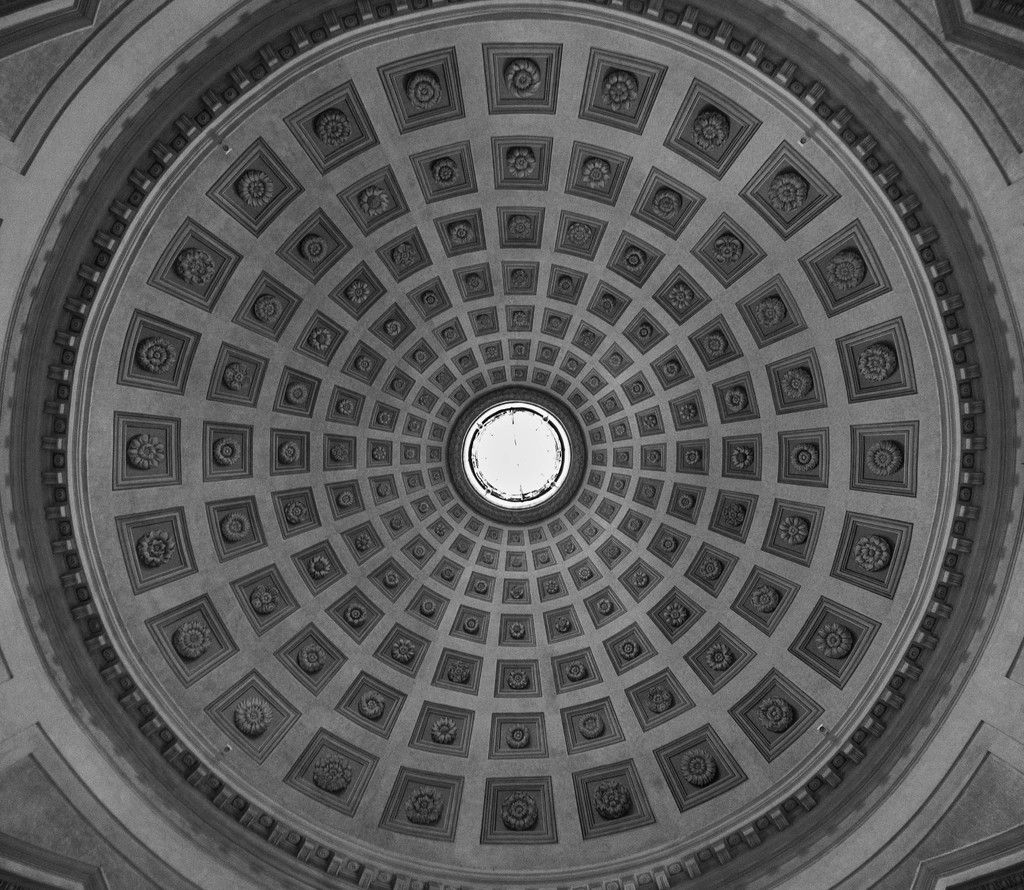 In this image, we can see the roof with some design.