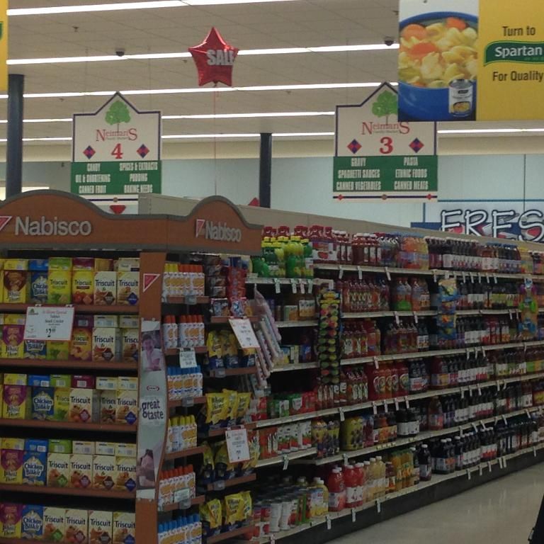 In this picture I can see there is a super market here and it has some groceries and there are some...