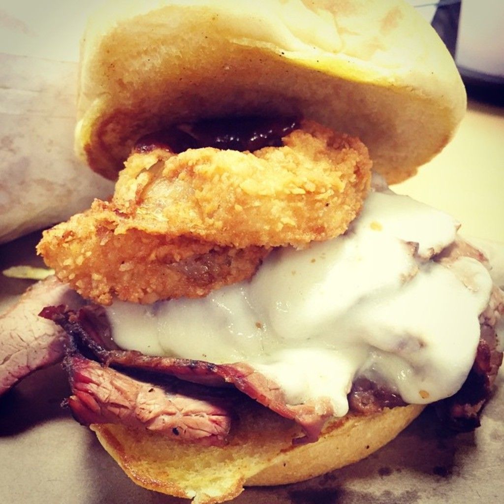 In this image I can see food contains breads and cream.