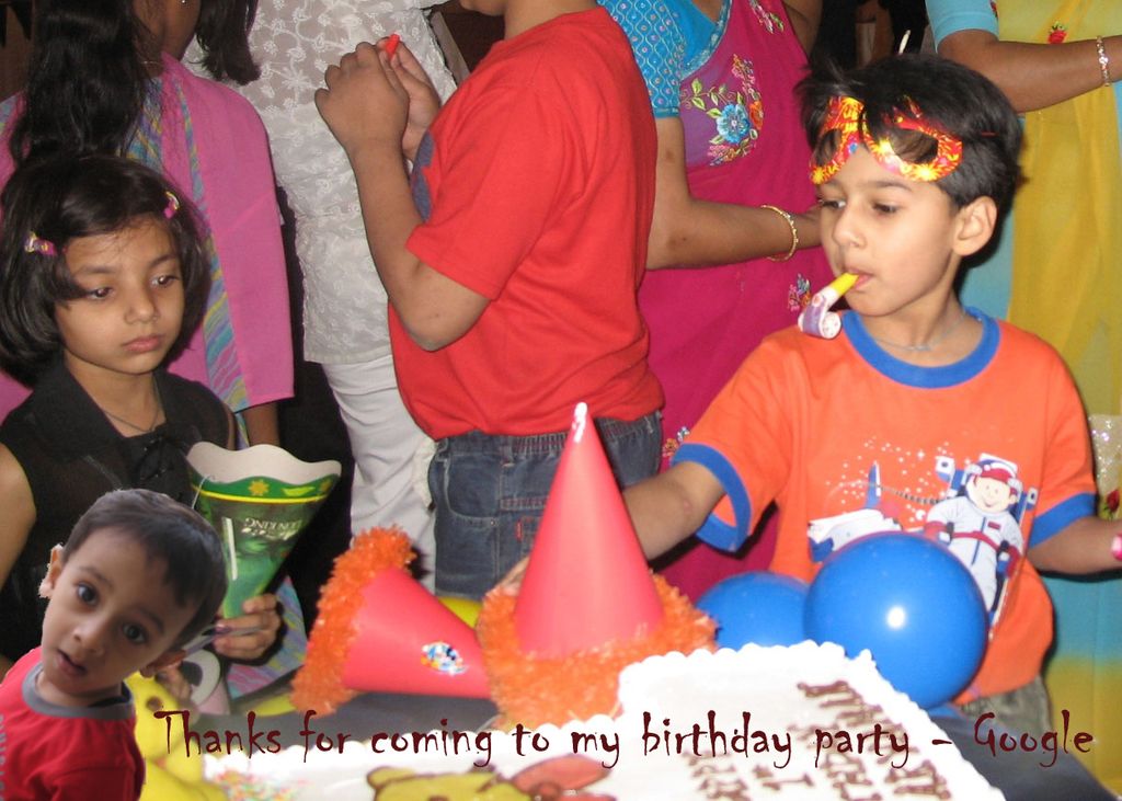 This is the picture of a place where we have some kids in front of the table on which there is a...