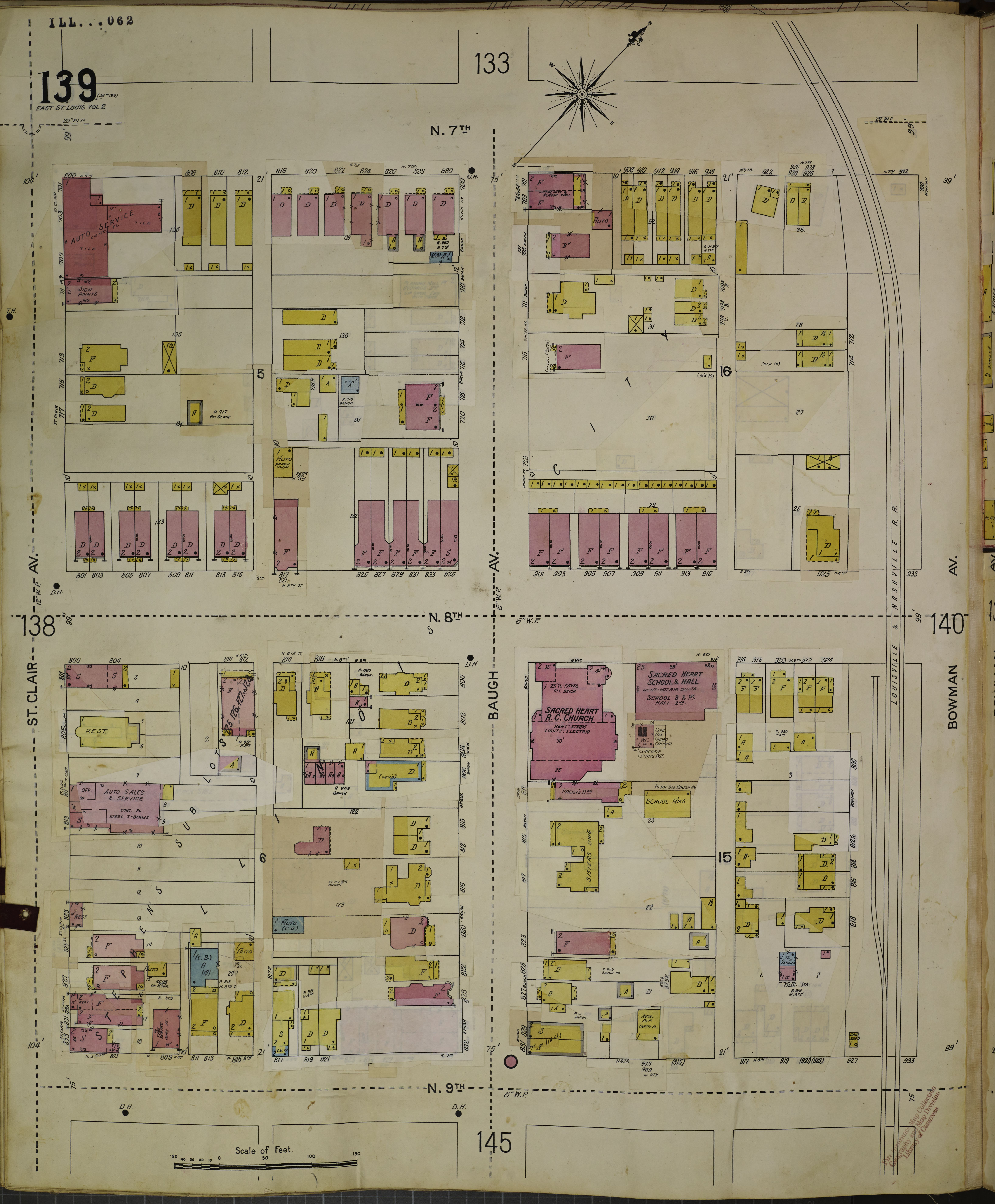 The image shows an old book with a map of the city of San Francisco, California, with various...