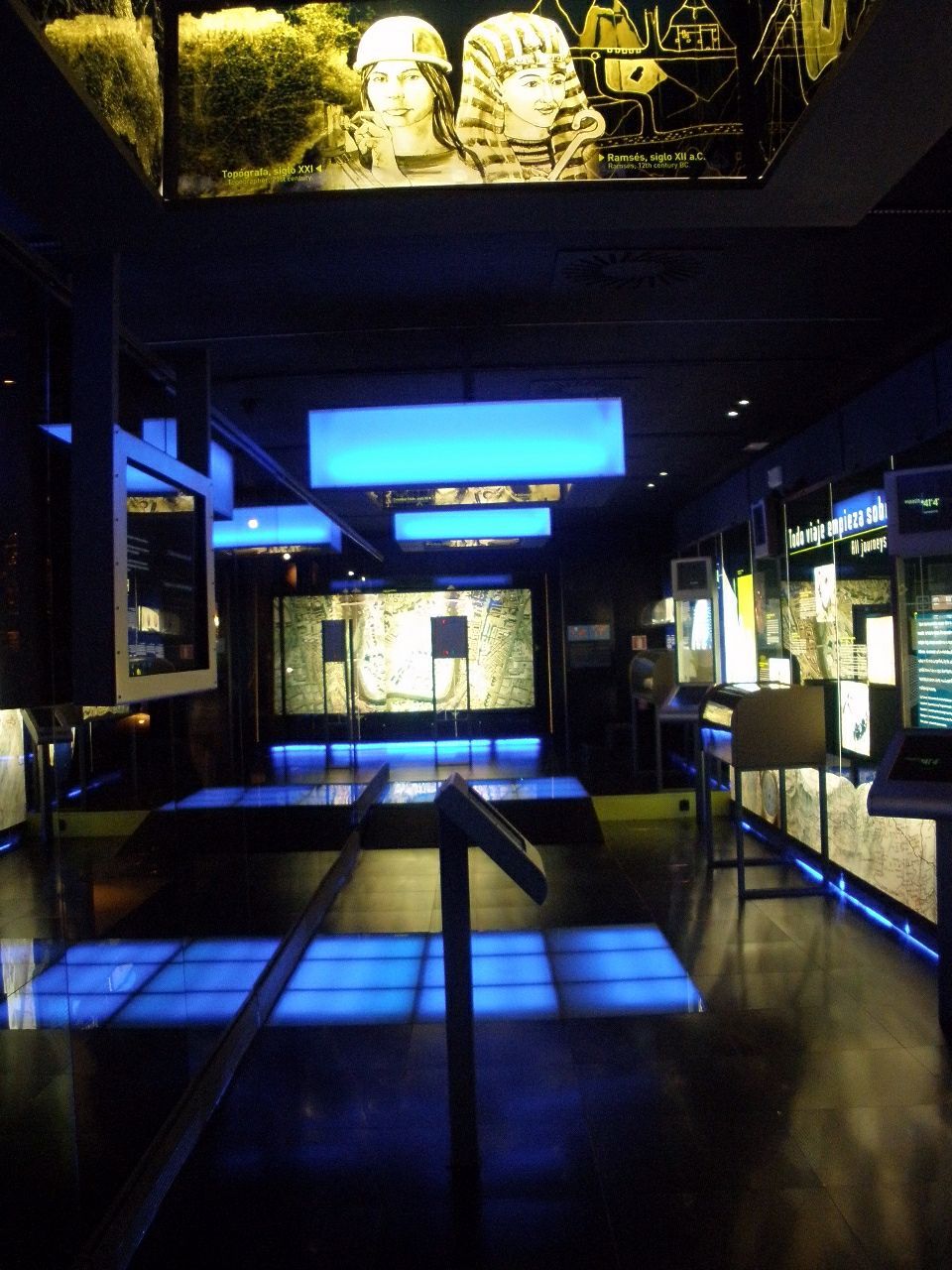 The image shows a room filled with lots of different types of video games, including machines,...