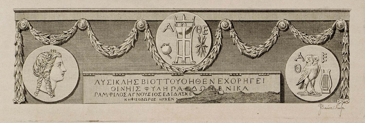 The image shows a black and white drawing of a plaque with a woman's face on it, surrounded by...