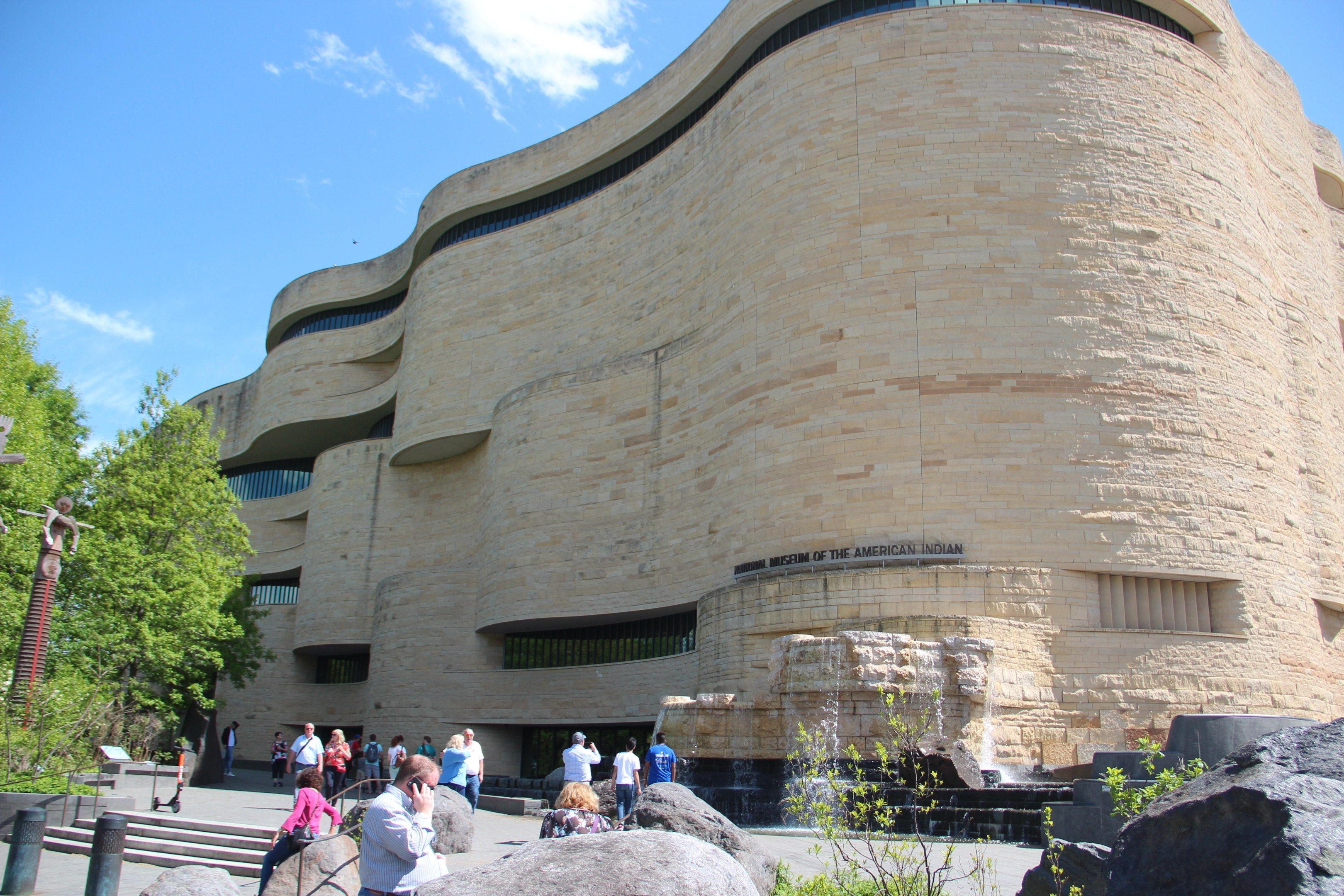 The image shows the Guggenheim Museum in New York City. It is a large building with windows and...