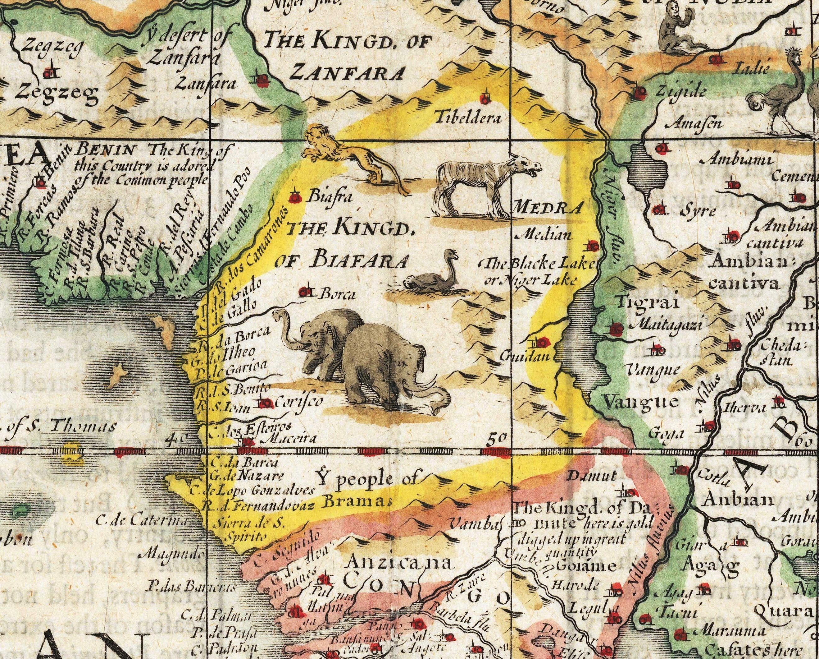 The image shows an old map of Africa with animals and text on it. The map is detailed and shows the...