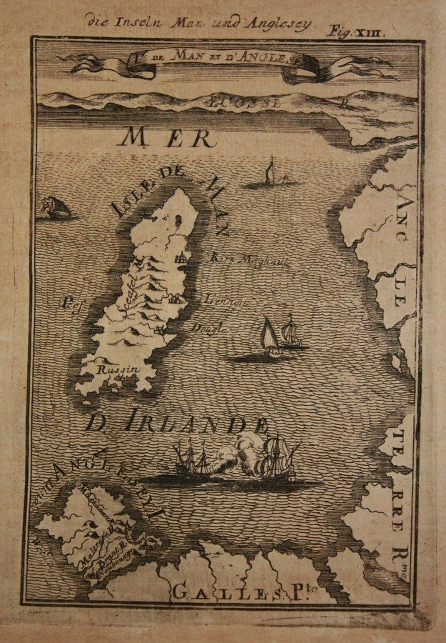 The image shows an old book with a map of Ireland on it. The map is detailed and shows various...