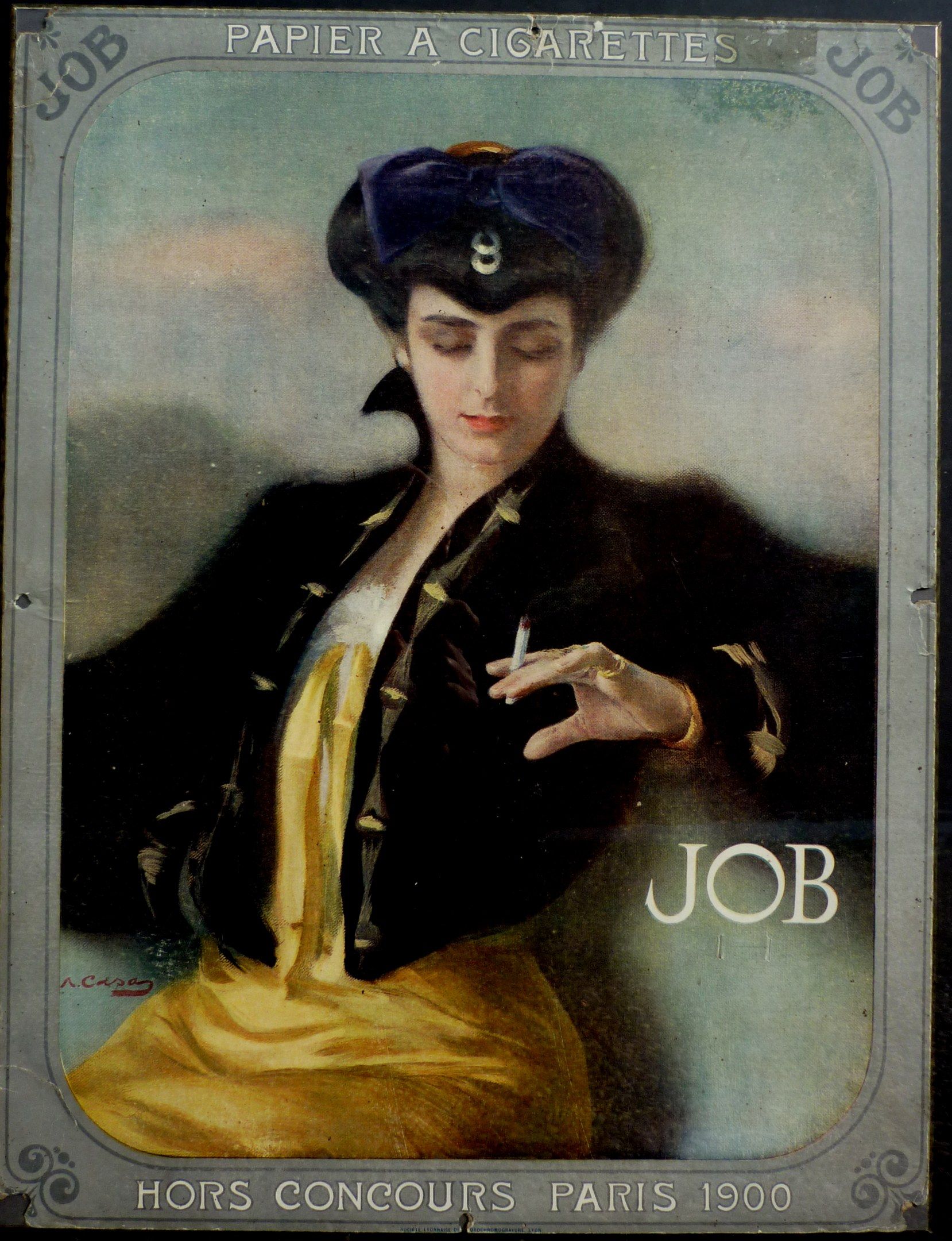 The image shows a woman smoking a cigarette in front of a black background. She has a serious...