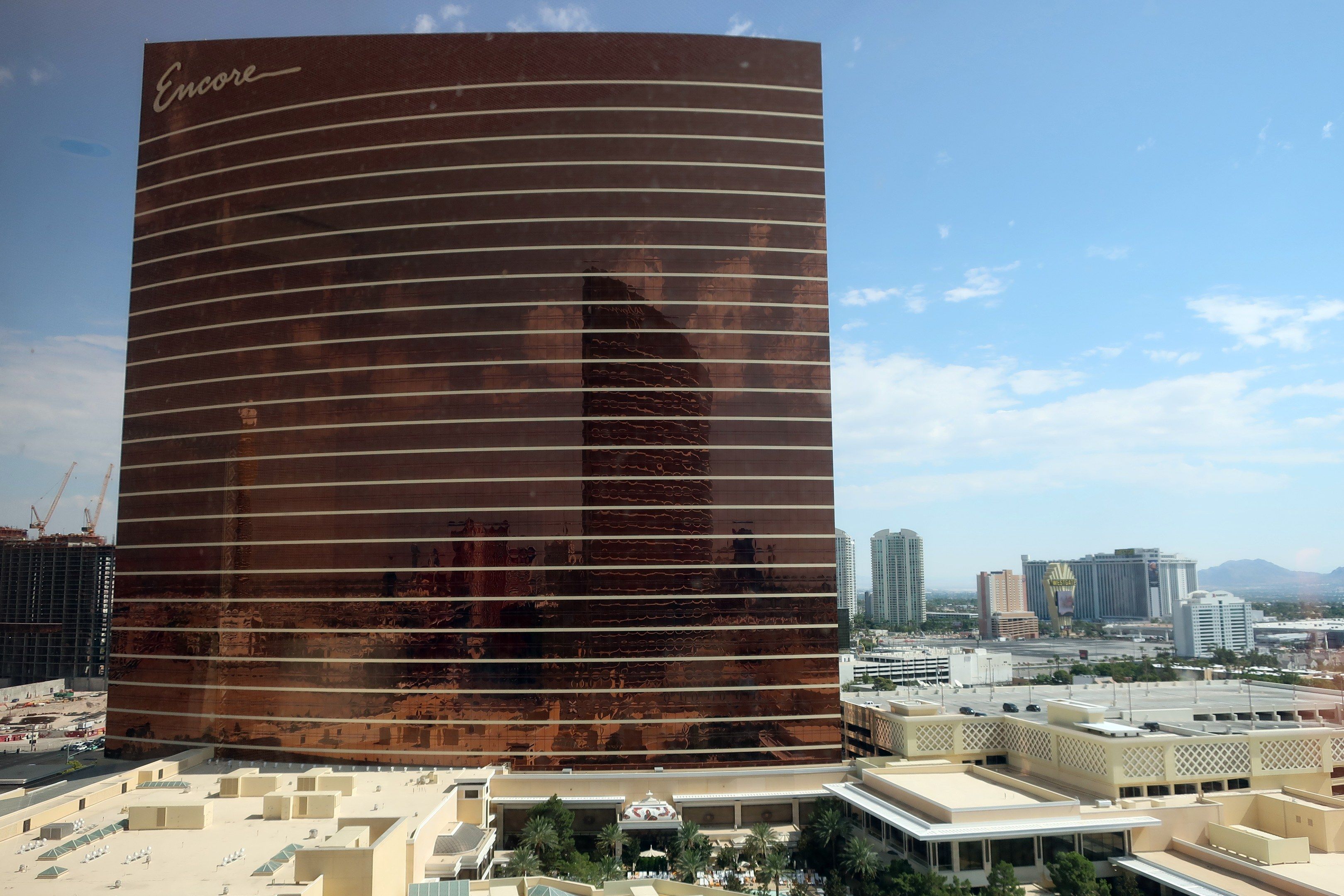 The image shows the Wynn Hotel and Casino in Las Vegas, Nevada. At the bottom of the image, there...