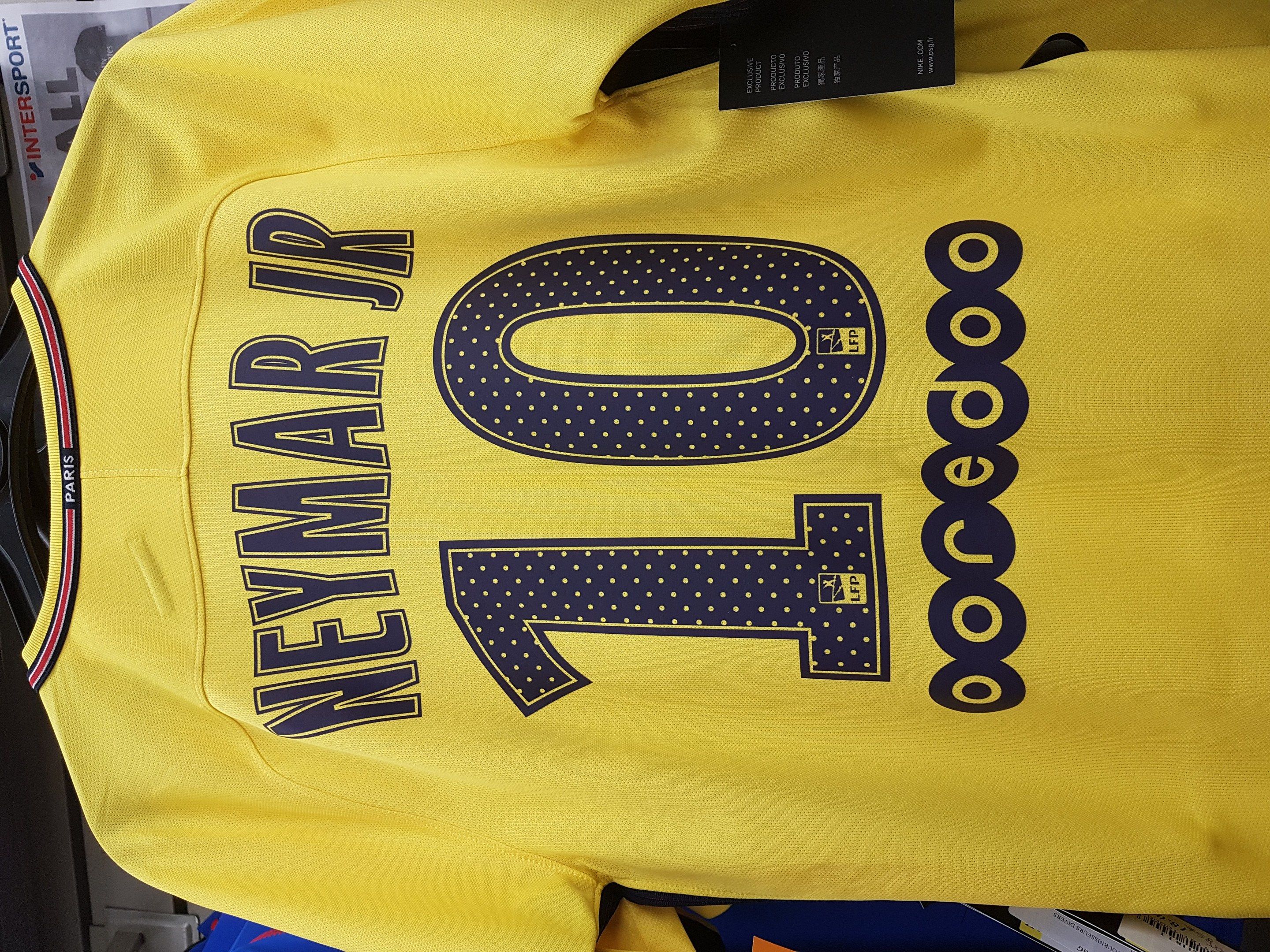 The image shows a yellow soccer jersey with the number 10 on it, belonging to Neymar Jr. from the...