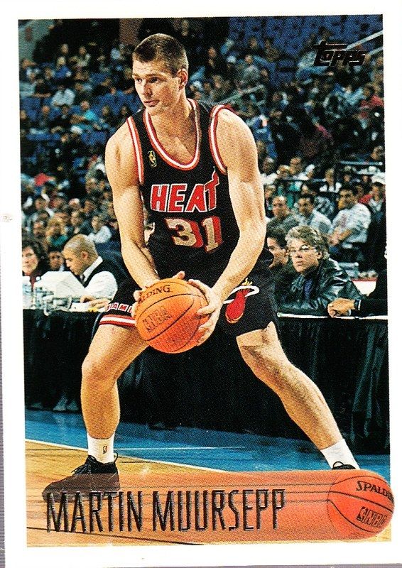 The image shows a photograph of Martin Muirsepp, a former Miami Heat player, holding a basketball...