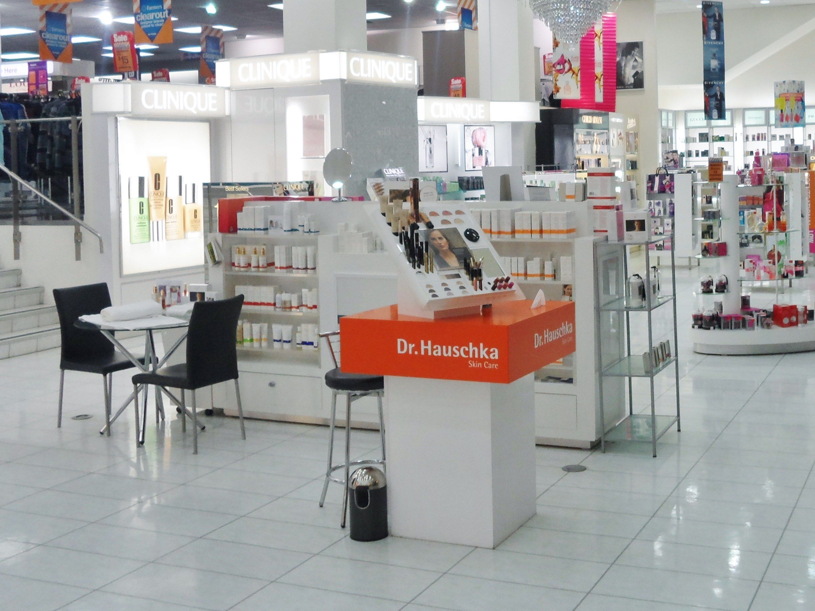 The image shows a store filled with lots of different types of cosmetics, including bottles, boxes,...