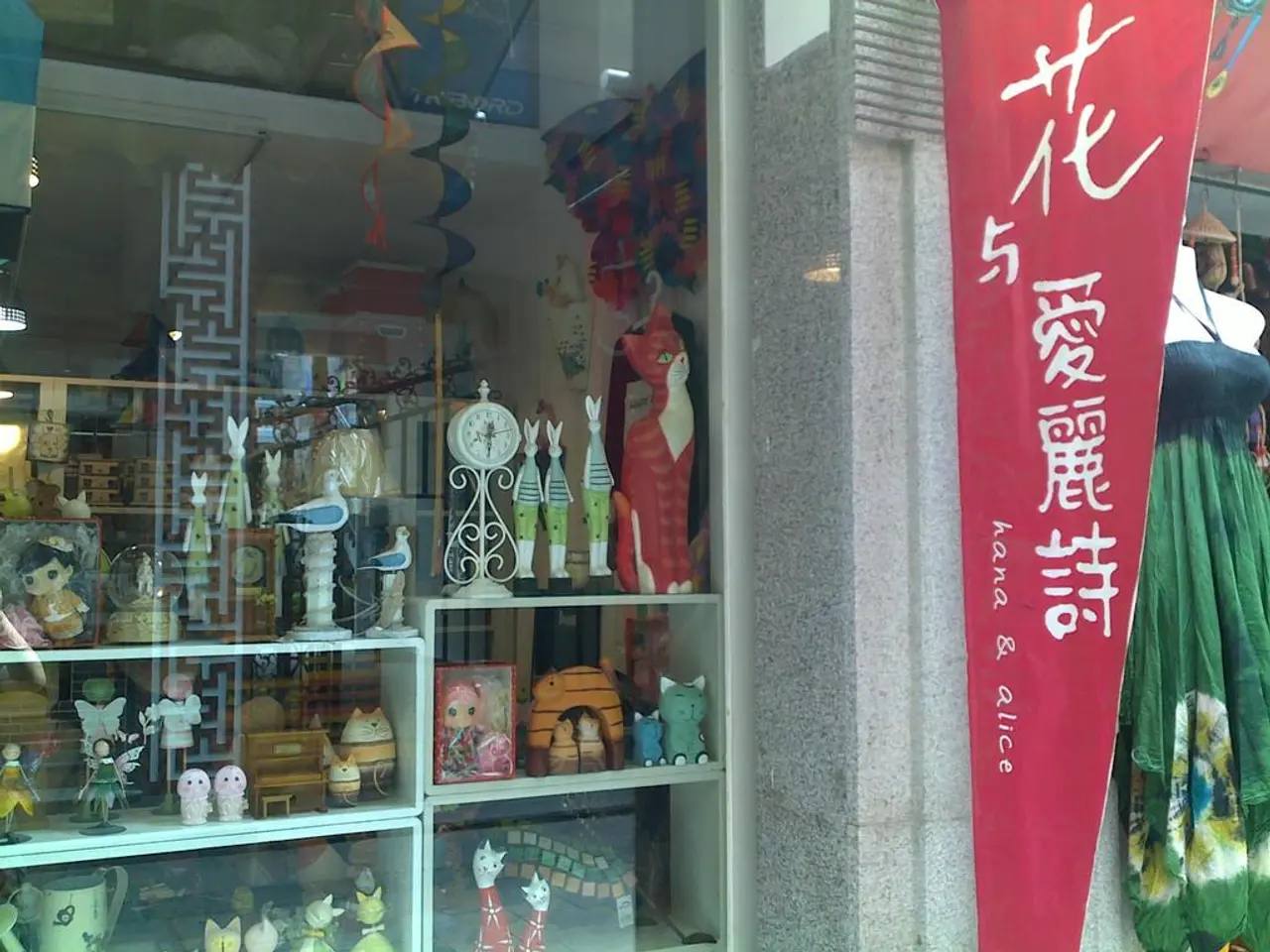 On the left there is are banner, mannequin, dream catcher and other objects. On the left there is a...