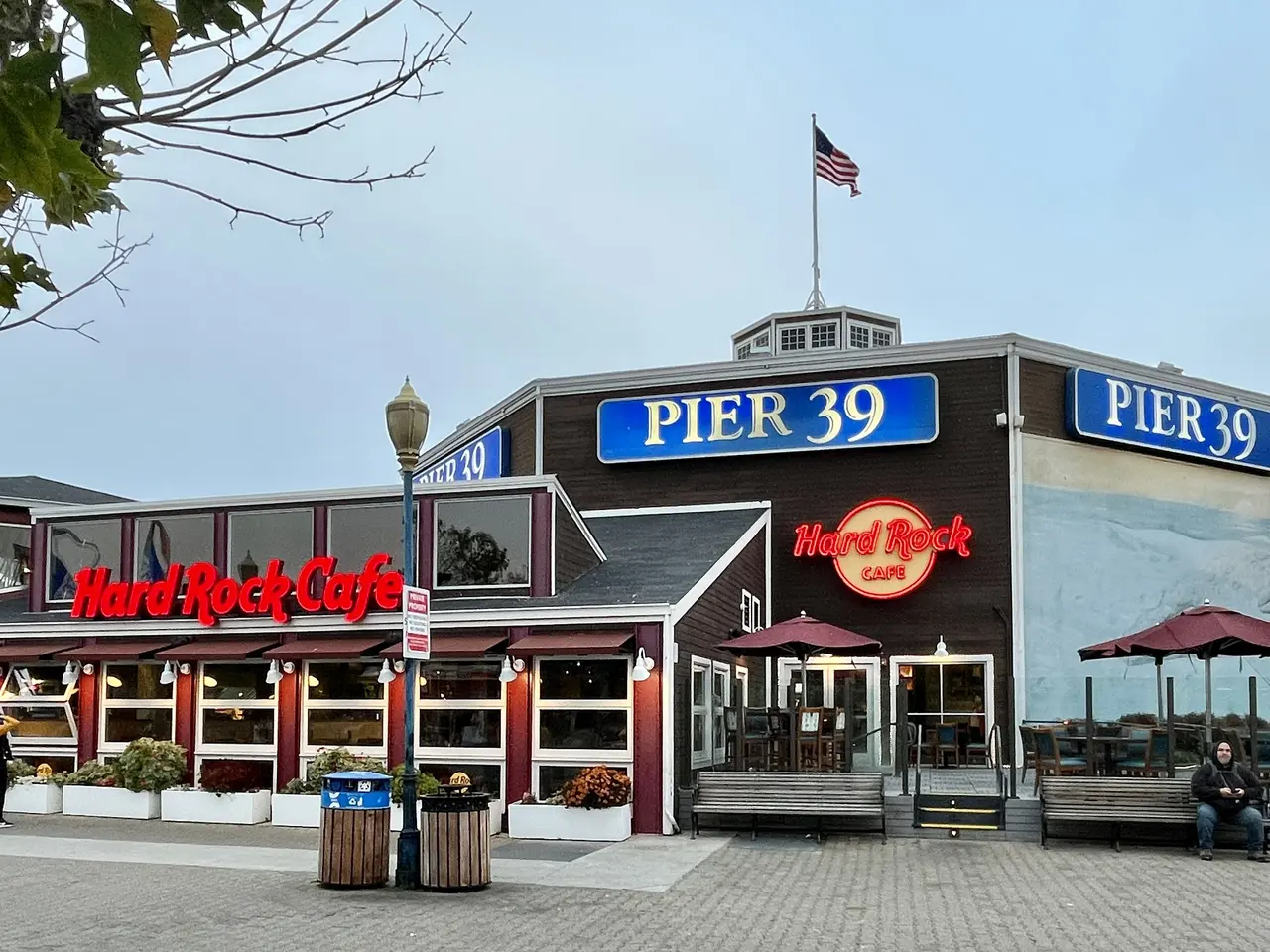 The image shows a pier 39 restaurant on the boardwalk in Atlantic City, New Jersey. There are...