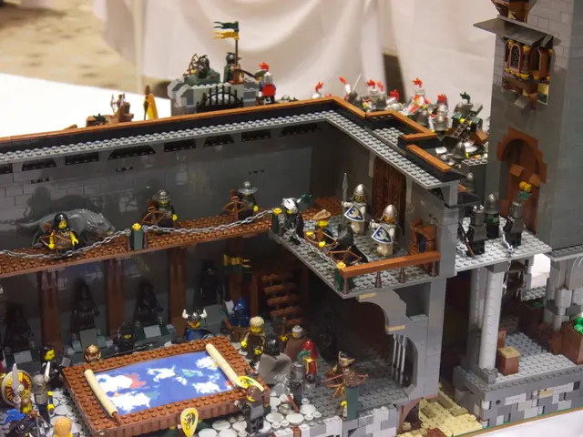 Military personnel station themselves on a hilltop