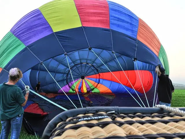 Skydiving mishap results in injury as two parachutes malfunction.