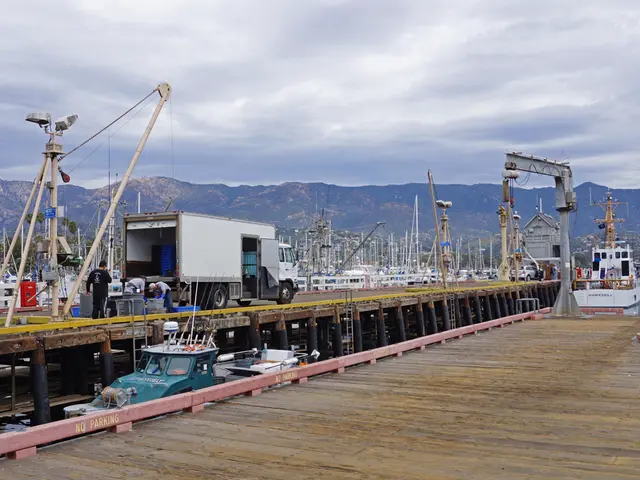 Vehicle precariously dangles from river bridge following fence collapse