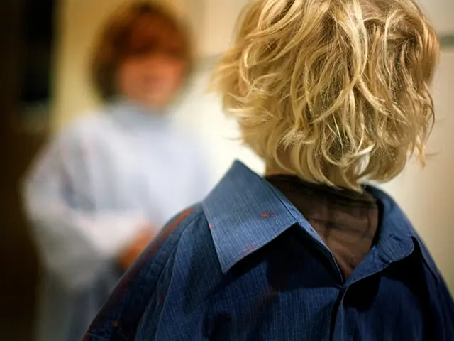 Two siblings with a distinctive feature share the same space