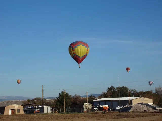 Aerial View of Vibrant Balloons Floating Above the Sky in Croatia