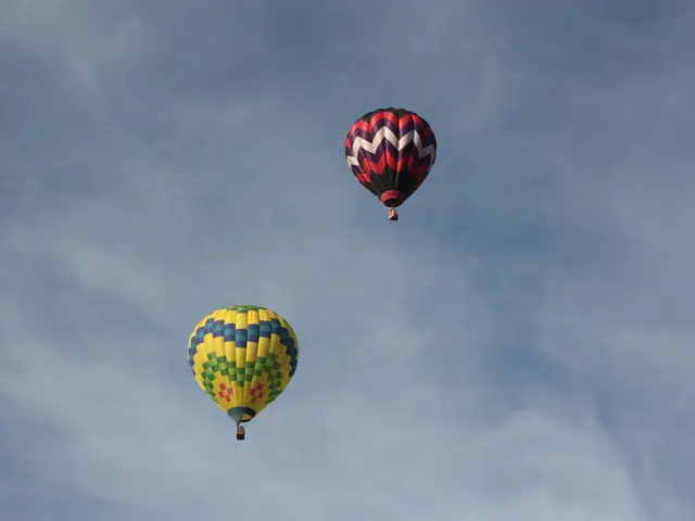 Aerial Spectacle in Sauerland: 150 Multi-colored Balloons from Warsteiner Montgolfiade