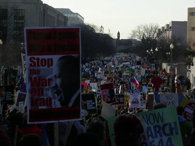 Demonstrators take to the streets in downtown Chicago in protest of anticipated escalation in ICE...