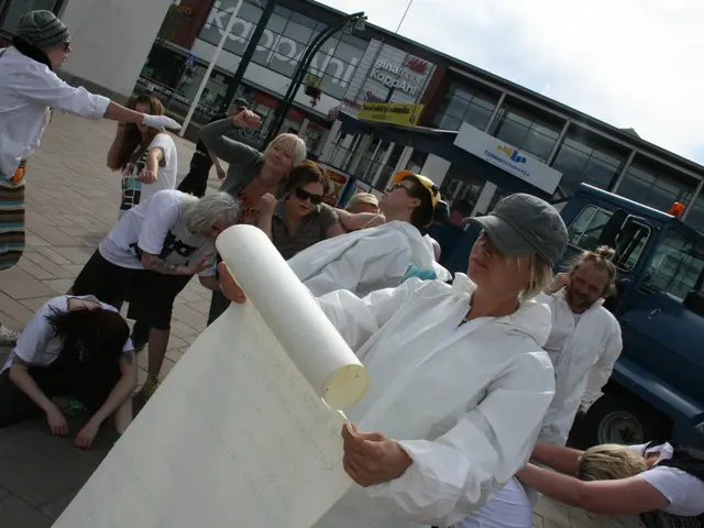 A group of four men brandishing knives faced off against a larger group who were demanding their...