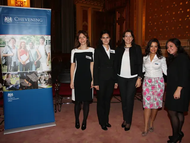 In the foreground of this image, on the left, there is a banner. Chairs in the background. On the...