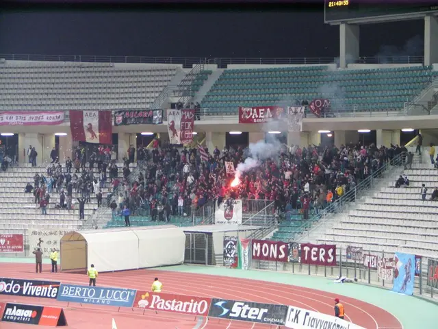 There are groups of people standing and few people are sitting on the chairs. These are the...