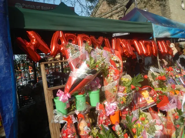 The image shows a flower shop with a variety of bouquets of flowers, teddy bears, buckets, and...