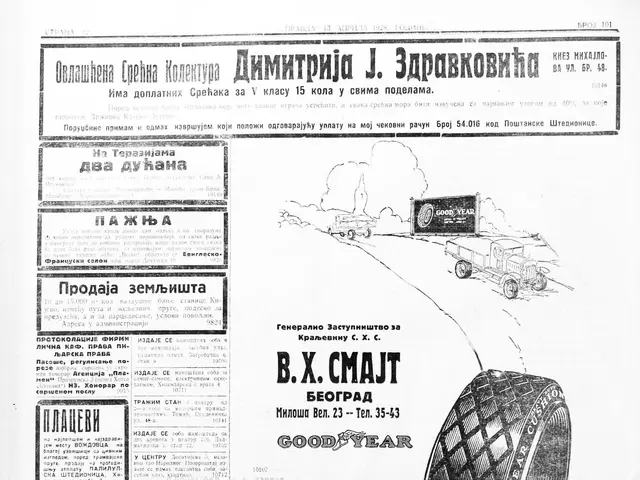 The image shows an old newspaper with a picture of a tire on it. The paper has text written on it,...