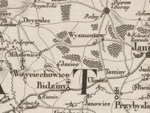 The image shows an old map of the city of Tbilisi, Georgia, with text written on it. The map is...