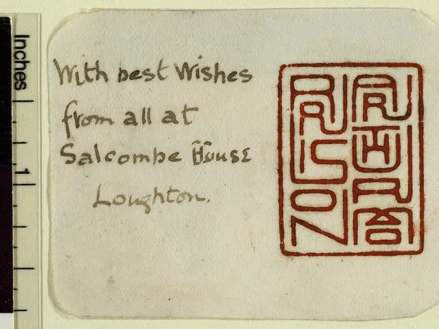 The image shows a piece of paper with a stamp on it that reads "with best wishes from all at...