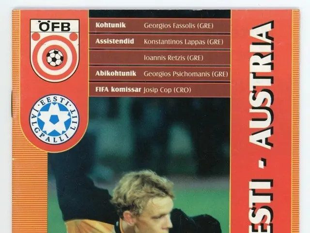 The image shows a soccer card with a picture of a soccer player on it. The card is from the 1998...