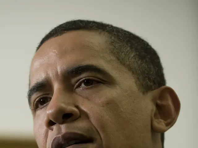 The image shows President Barack Obama speaking during a news conference in the East Room of the...