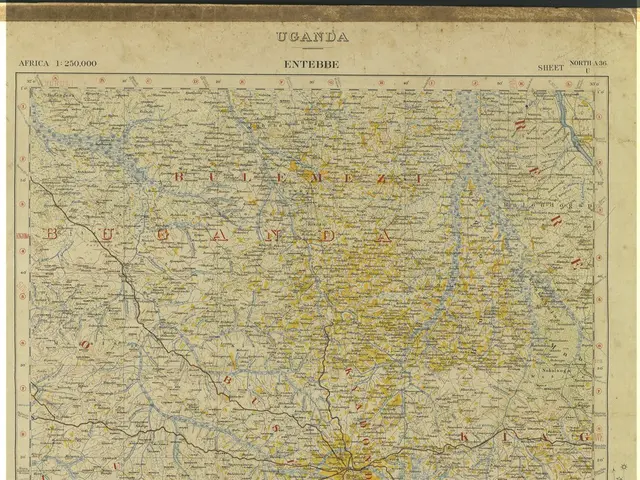 The image shows an old map of Uganda with a black background. The map is filled with text,...
