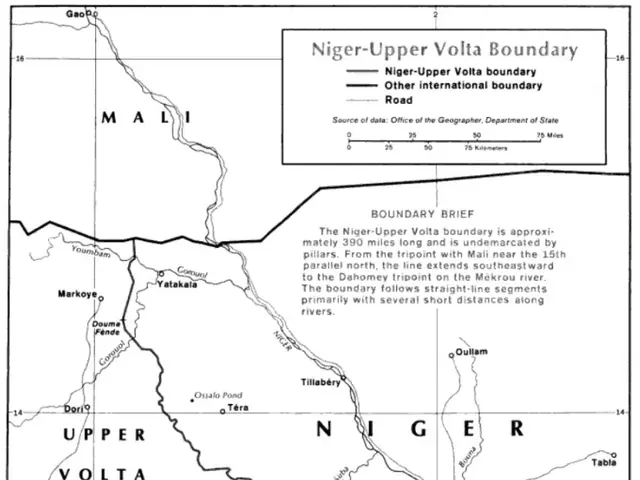 The image shows a poster with a black and white map of Nigeria, depicting the Upper Volta Boundary....