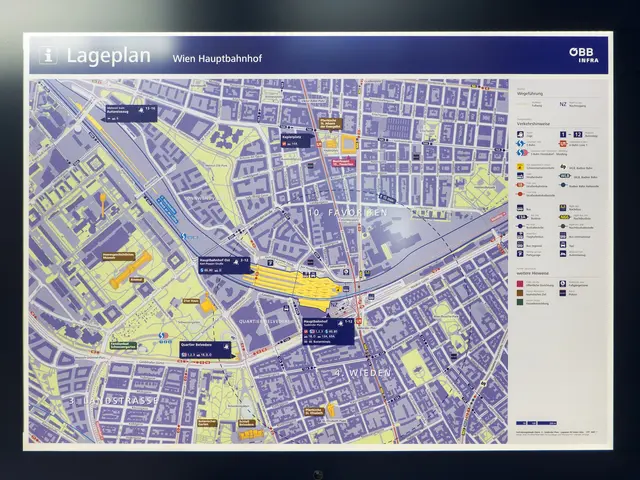 The image shows a large screen with a map of a city on it. The map is detailed and shows the...