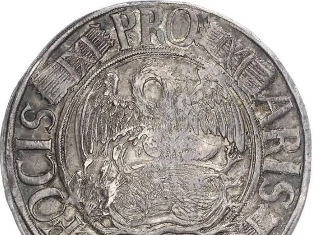 The image shows a silver coin with an eagle on it against a white background. The coin is from the...