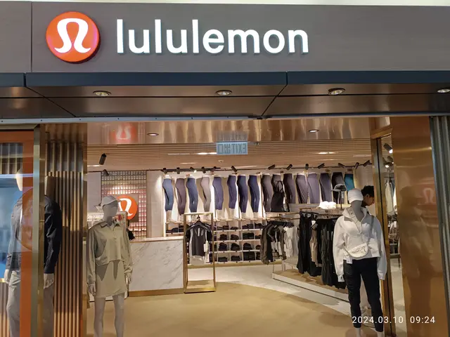 The image shows a lululemon store in Hong Kong, with mannequins wearing the latest fashion, clothes...