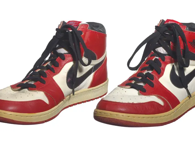 The image shows a pair of Nike Air Jordan 1 Retro High OG Bred Toe shoes against a white...