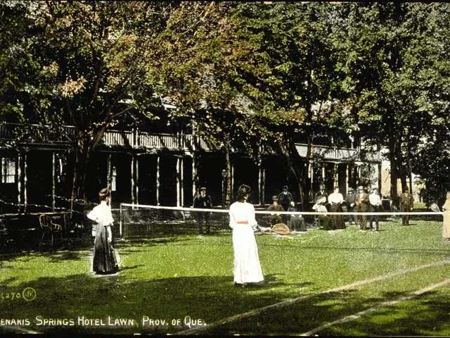 The image shows an old photo of a group of people playing tennis in front of the Abenakis Springs...