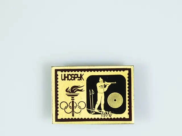 The image shows a white surface with a sticker featuring a picture of a man on a skateboard, along...