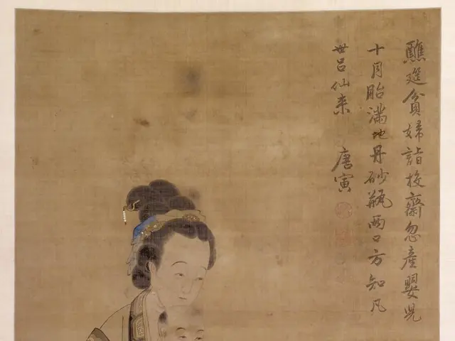 The image shows a Chinese painting of a woman holding a baby, with text written on the paper. The...