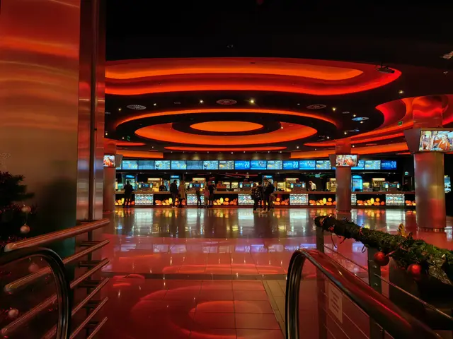 The image shows the inside of a casino with a Christmas tree in the middle of it. The floor is...