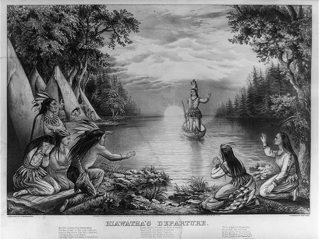 The image shows a group of Native American Indians in a canoe on a river, surrounded by trees and a...