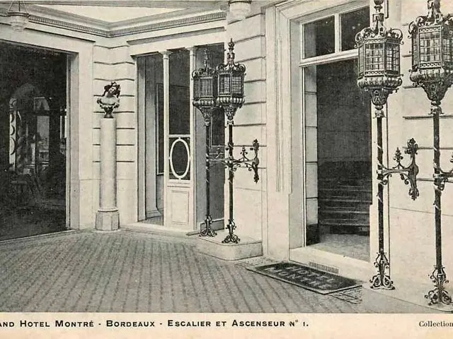The image shows an old black and white photo of the entrance to the Grand Hotel Montréal in...