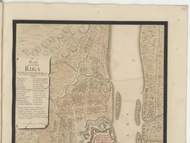 The image shows an old map of the city of Riga, Latvia, with text on the paper. The map is detailed...